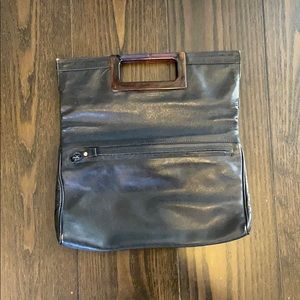 Vintage convertible black leather clutch